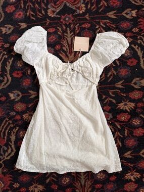 Kittenish White Eyelet Puff-Sleeve Mini Dress